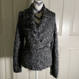 Warm INC cardigan with large pin at waist